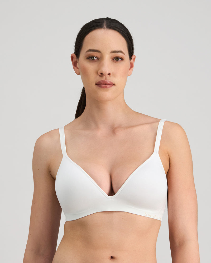 Model wears Simply Seamless Wire Free Bra in Basic Wht. On body front view