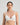 Model wears Simply Seamless Wire Free Bra in Basic Wht. On body front view