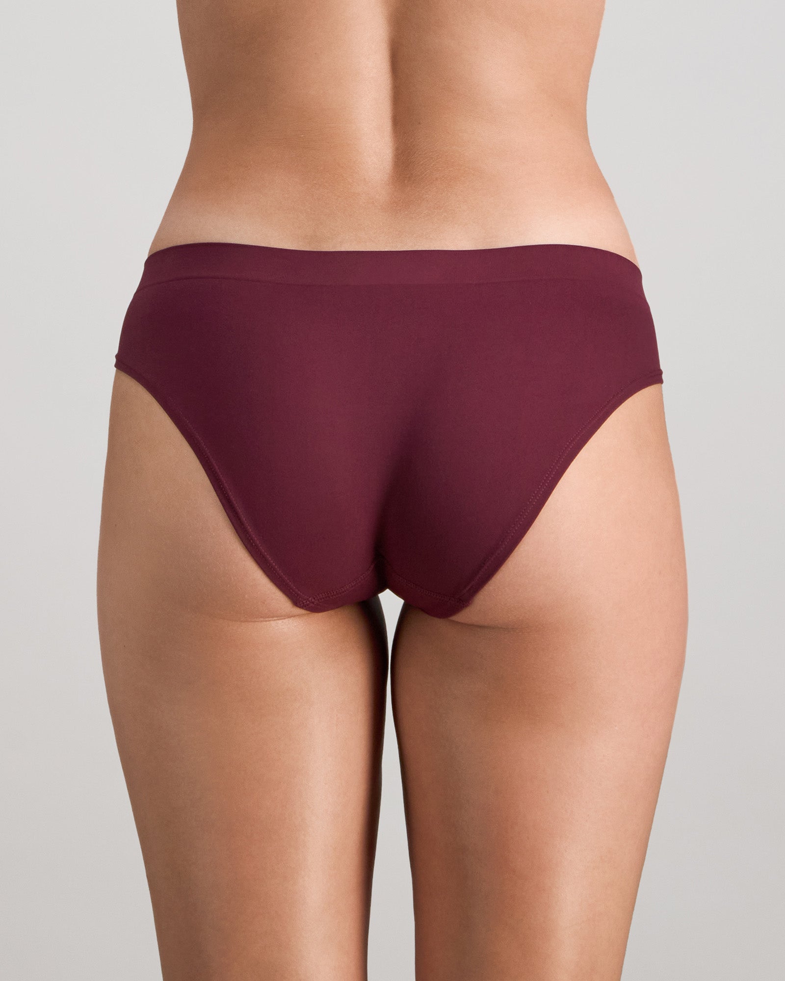 Model wears Seamless Soft Bikini in FIG. On body back view