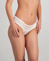 Model wears Morning Lola Midi in WHITE. On body side view