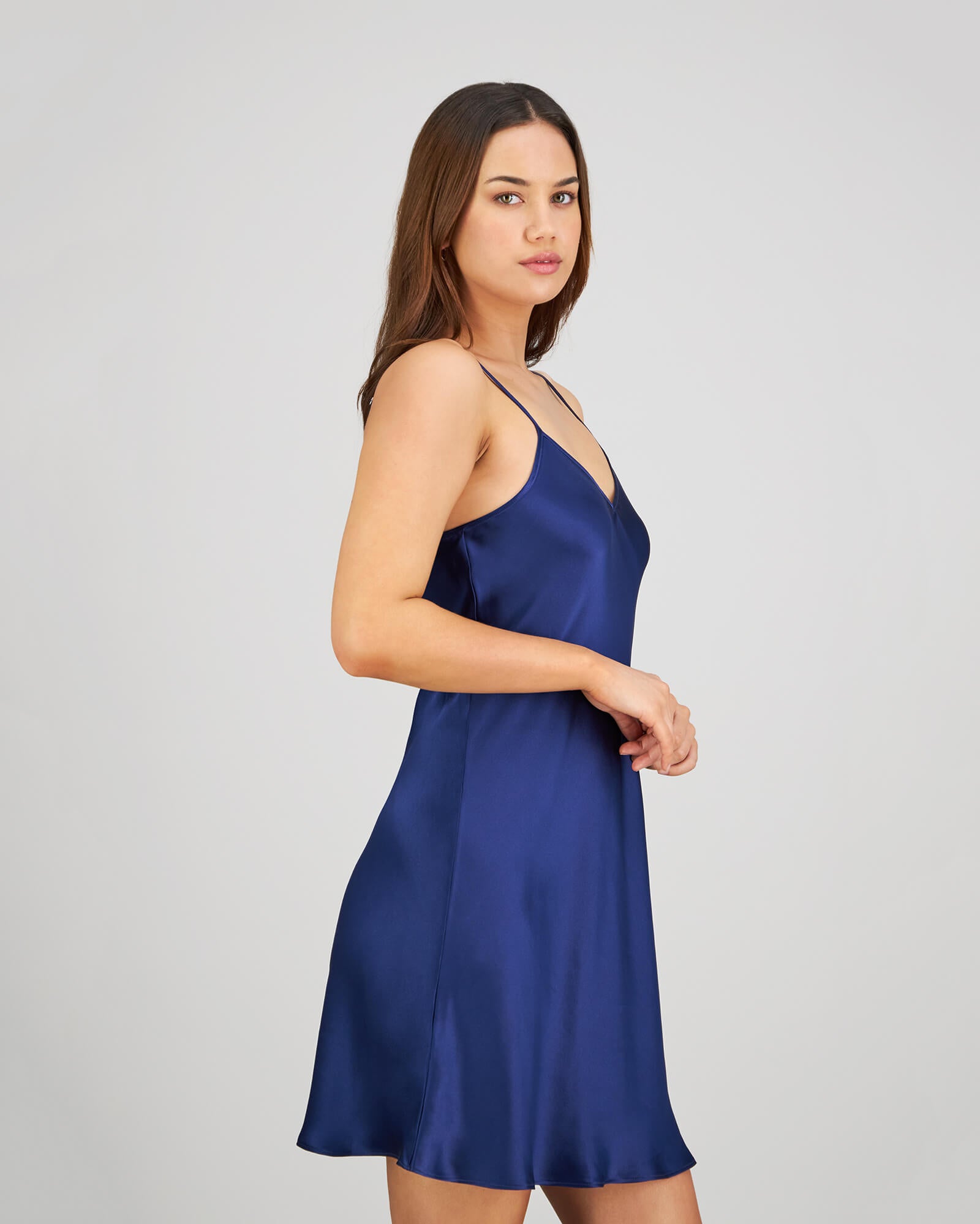 Model wears Silk Brilliance Chemise in INK. On body side view
