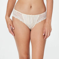 Model wears Yvette Bikini in NATURAL. On body front view