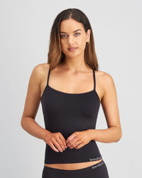 Model wears Simply Seamless Camisole in BLACK. On body front view