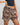 Model wears Sleigh The Night Boxer in WILD LYNX PRINT. On body side view