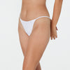 Model wears Clemence Thong in WHITE. On body front view