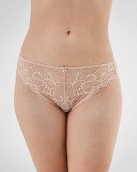 Model wears Embrace Bikini in LATTE. On body front view