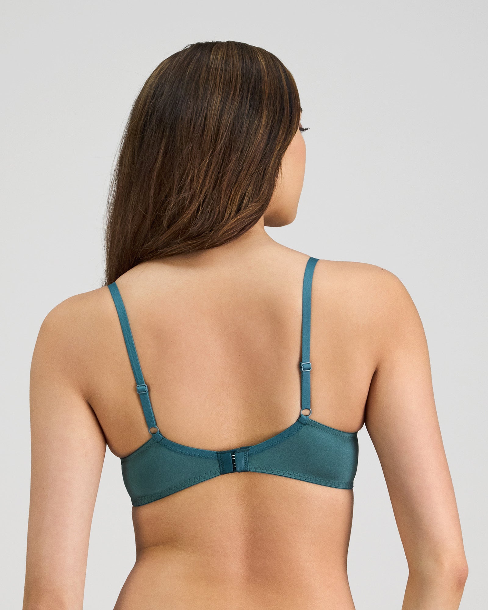 Model wears Coco Divine Contour Bra in MEDITERRANEA. On body back view