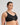Model wears Bendon Sports Underwire Bra in BLACK. On body side view
