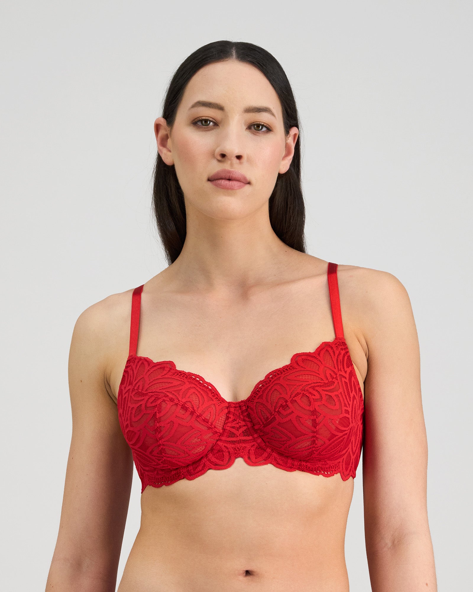 Model wears Laura Underwire Bra in SALSA. On body front view