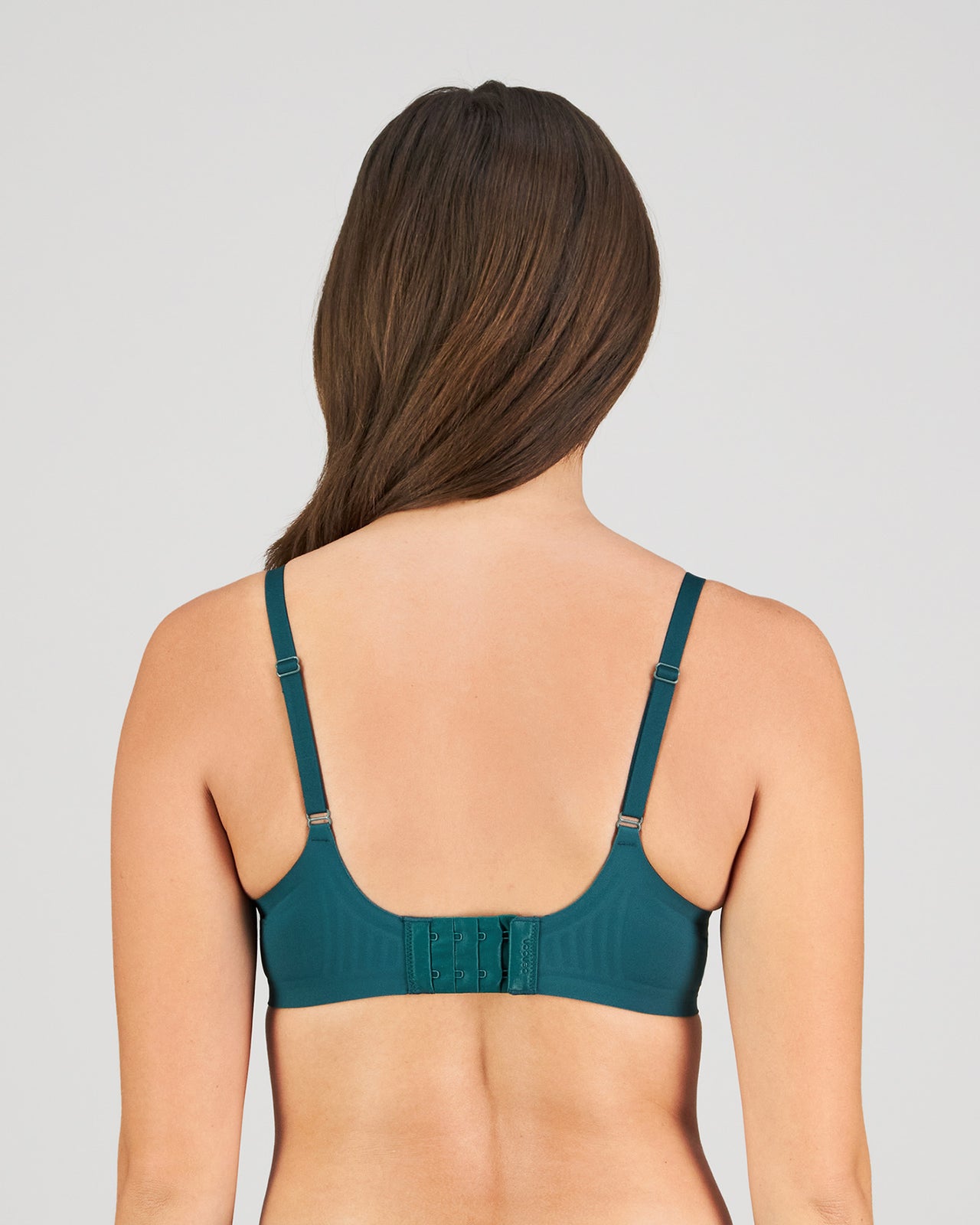 Model wears Comfit Collection Contour Bra in RAIN FOREST. On body back view