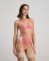 Model wears Josephine Suspender in SACHET PINK. On body side view