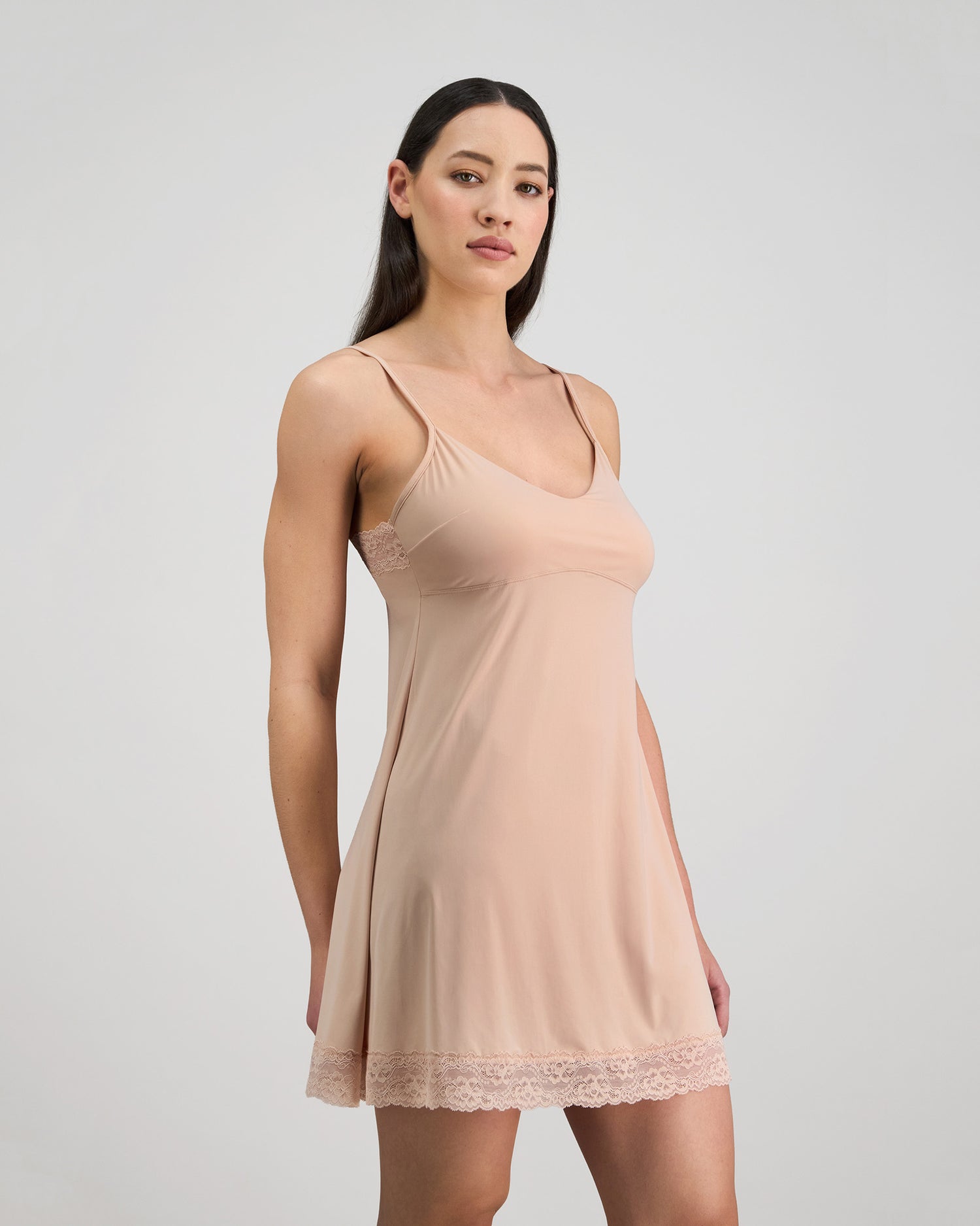 Model wears Understatement Slip in LATTE. On body side view