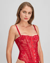 Model wears Lace Me Up Corset in JESTER RED. On body side view