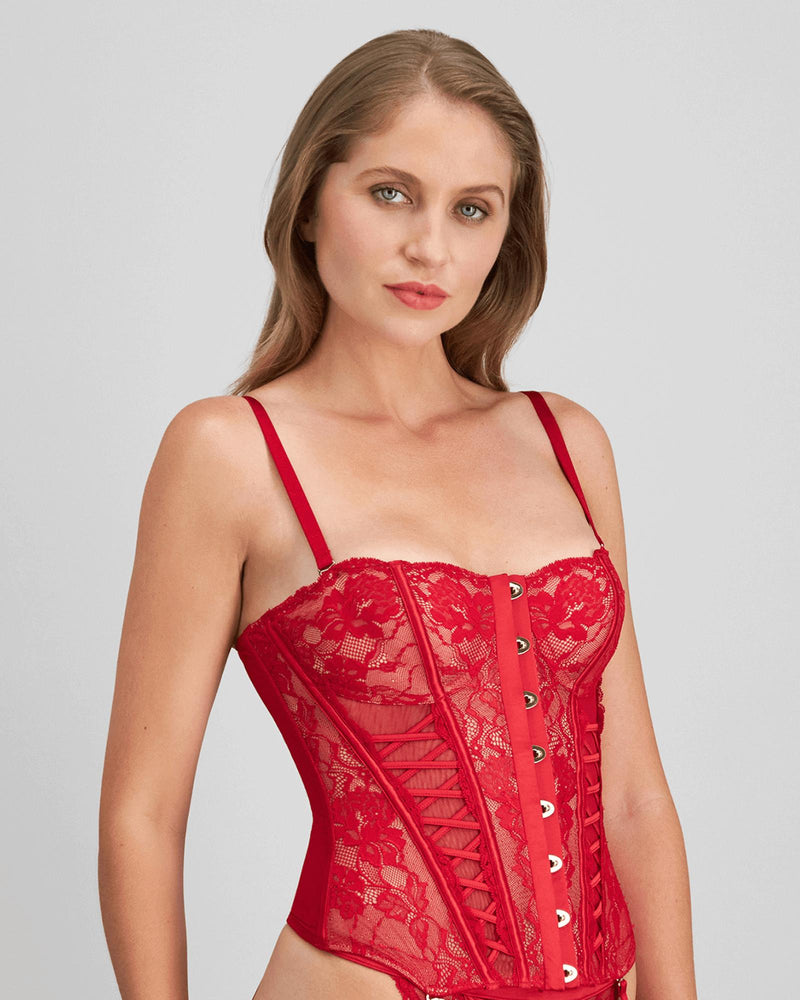 Model wears Lace Me Up Corset in JESTER RED. On body side view