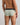 Model wears Everyday Essential Mens Brief in ICEBERG GREEN. On body back view