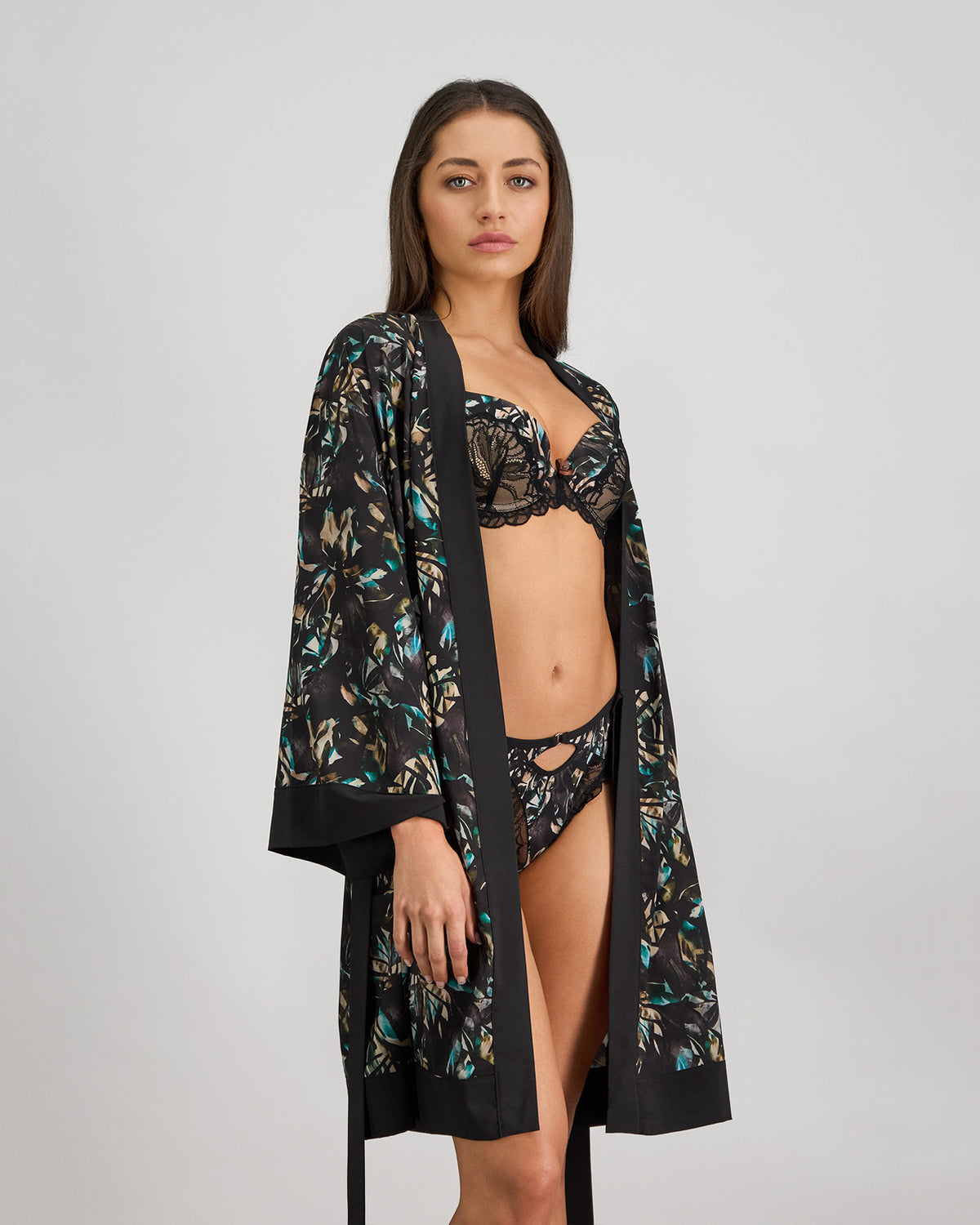 Model wears Lost Paradise Robe in BLACK PRINT. On body front view