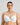 Model wears Sculpt Contour Bra in WHITE. On body front view