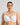 Model wears Sculpt Contour Bra in WHITE. On body front view