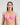 Model wears Lightweight Underwire Bra in BUBBLEGUM PINK. On body front view
