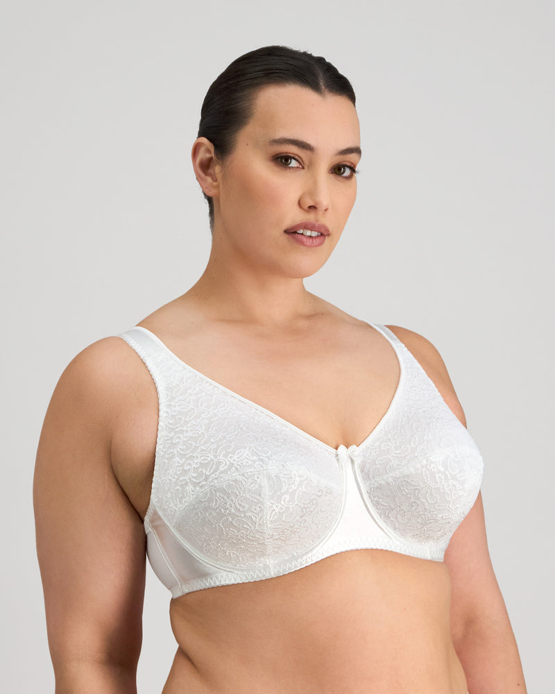 Model wears Charlotte Underwire Bra in WHITE. On body side view