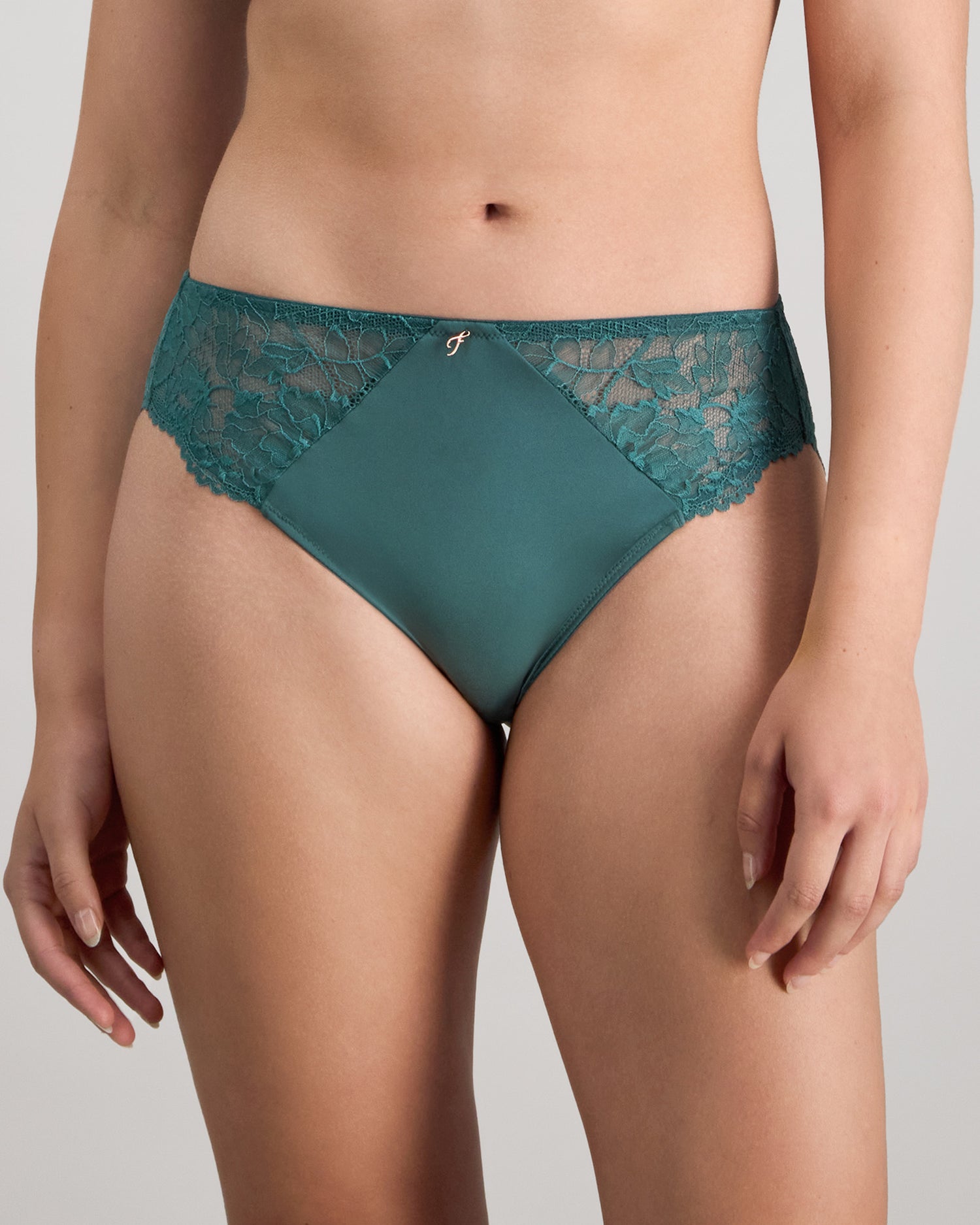 Model wears Laurel High Cut Brief in MEDITERRANEA. On body front view