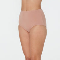 Model wears Freestyle Full Brief in COCOA. On body front view