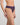 Model wears Jessie Thong in PURPLE VELVET. On body side view