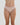 Model wears Stretch Cotton Thong in LATTE. On body front view