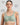 Model wears Power Underwire Bra in ICEBERG GREEN. On body front view