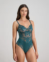 Model wears Margot Estelle Bodysuit in MEDITERRANEA. On body side view