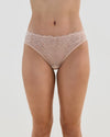 Model wears Lacey Bikini in LATTE. On body front view