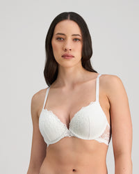 Model wears My Fit Lace Push Up Bra in WHITE. On body front view
