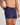 Model wears Classic Woven Boxer in PEACOAT. On body side view