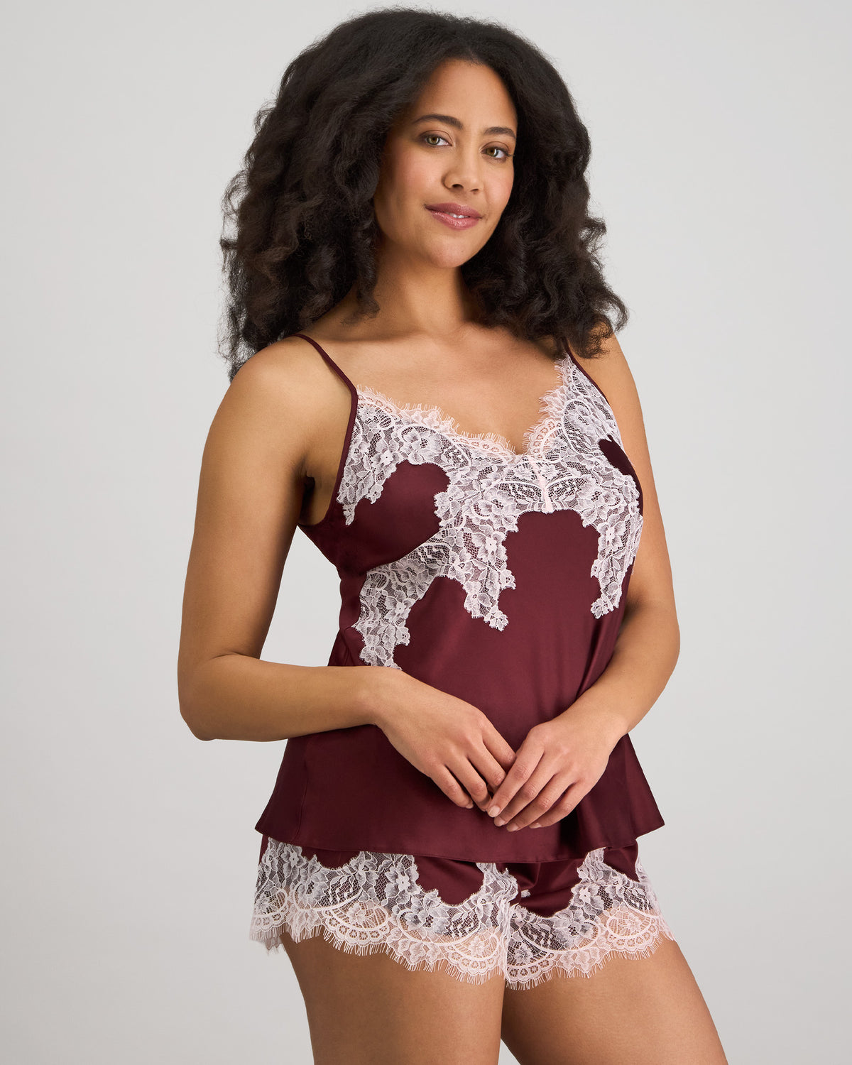 Model wears Sweet Indulgence Cami & Short Set in FIG/PALE LILAC. On body side view