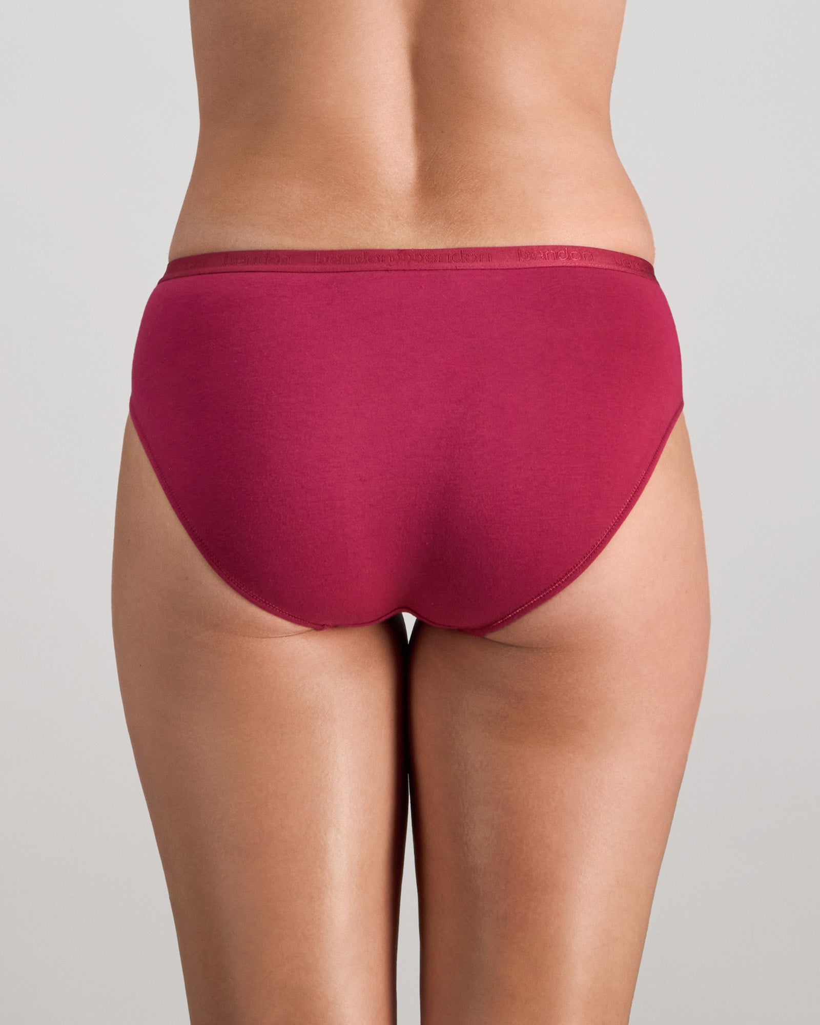 Model wears Body Cotton Bikini in BEAUJOLAIS. On body back view