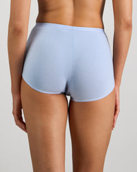Model wears Body Cotton Full Brief in SKYWAY. On body back view