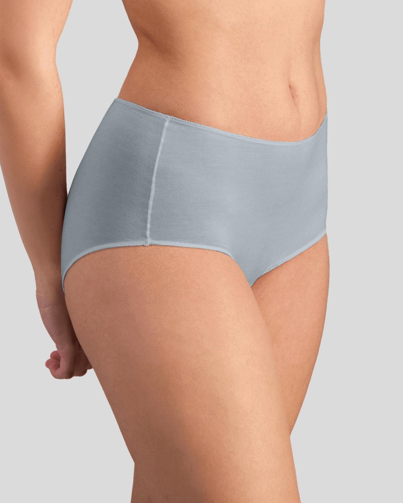 Model wears Au Naturel Full Brief in SLATE. On body side view
