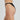 Model wears Fleur Midi in BLACK. On body side view