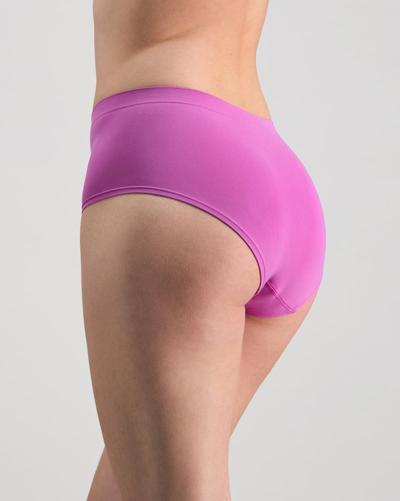 Model wears Seamless Soft Full Brief in RADIANT ORCHID. On body back view