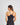 Model wears Simply Seamless Camisole in BLACK. On body back view