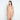 Model wears Medium Control Jumpsuit in CARAMEL. On body front view