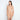 Model wears Medium Control Jumpsuit in CARAMEL. On body front view