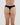 Model wears Stretch Cotton Thong in BLACK. On body back view