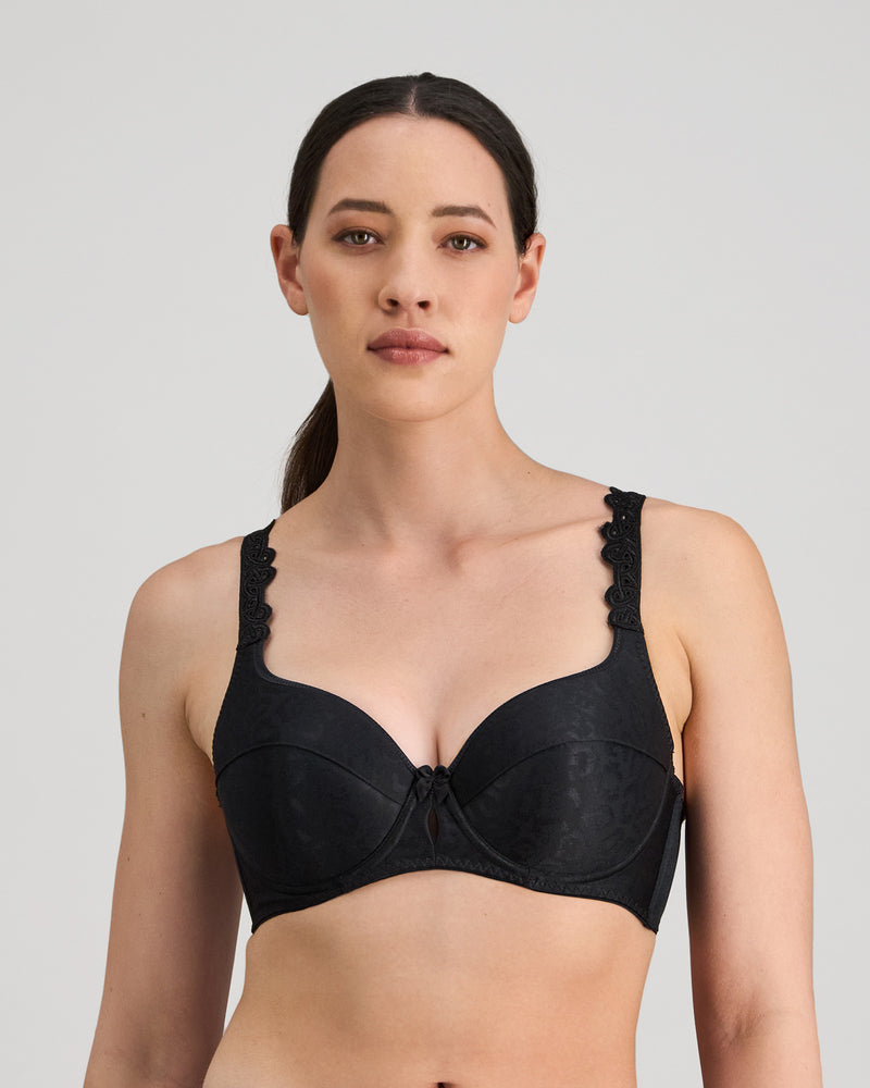 Model wears Damask Contour Bra in BLACK. On body front view
