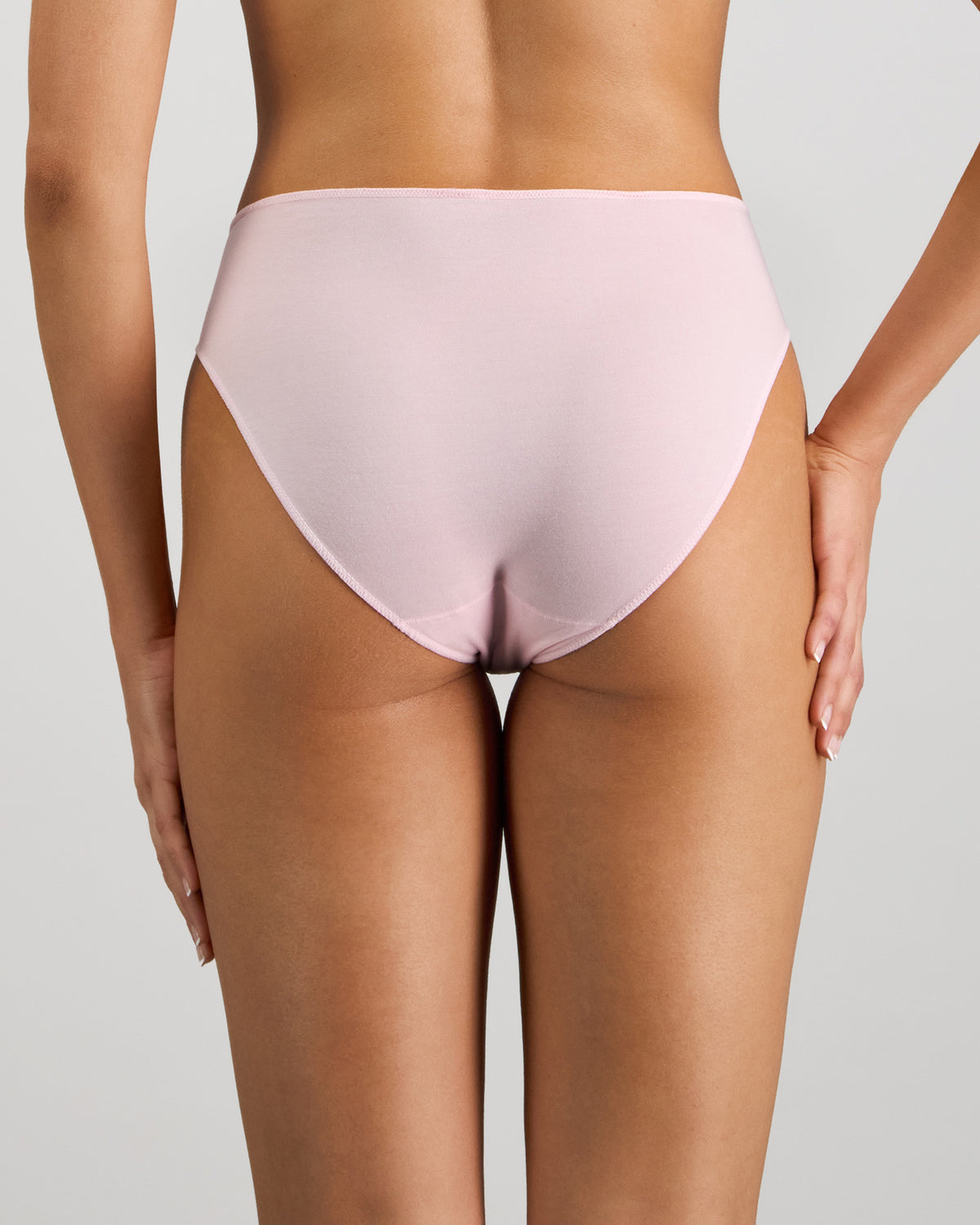 Model wears Au Naturel High Cut Brief in PALE LILAC. On body back view