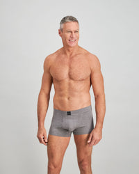 Model wears High Tech Cotton Mens Trunk in GREY MARL. On body front view
