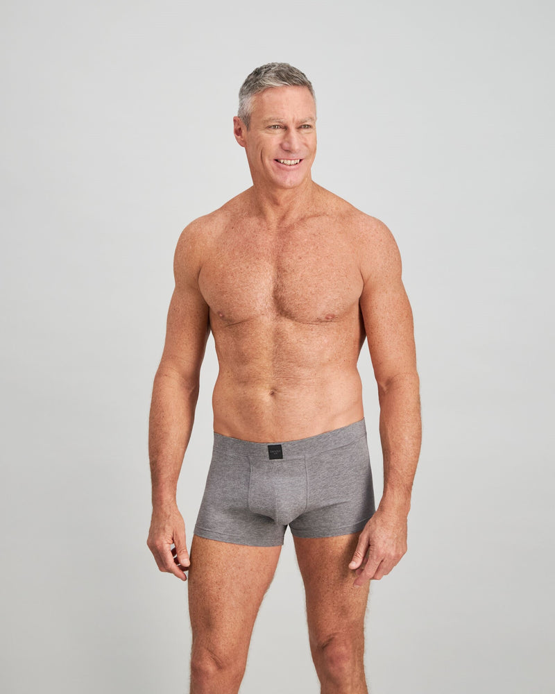 Model wears High Tech Cotton Mens Trunk in GREY MARL. On body front view