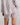 Model wears Cosy Flannel Short Pj in PINK-A-BOO. On body back view