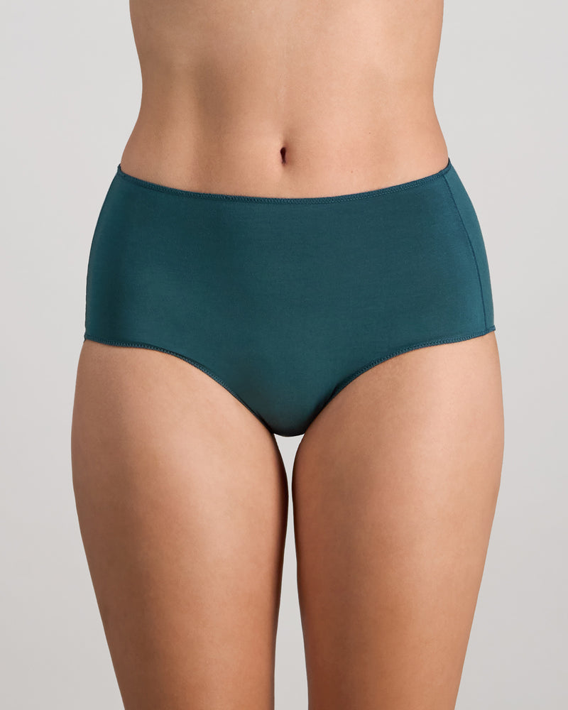 Model wears Au Naturel Full Brief in MEDITERRANEA. On body front view