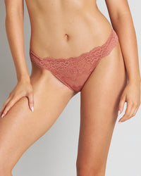 Model wears My Fit Lace Thong in CINNAMON. On body front view